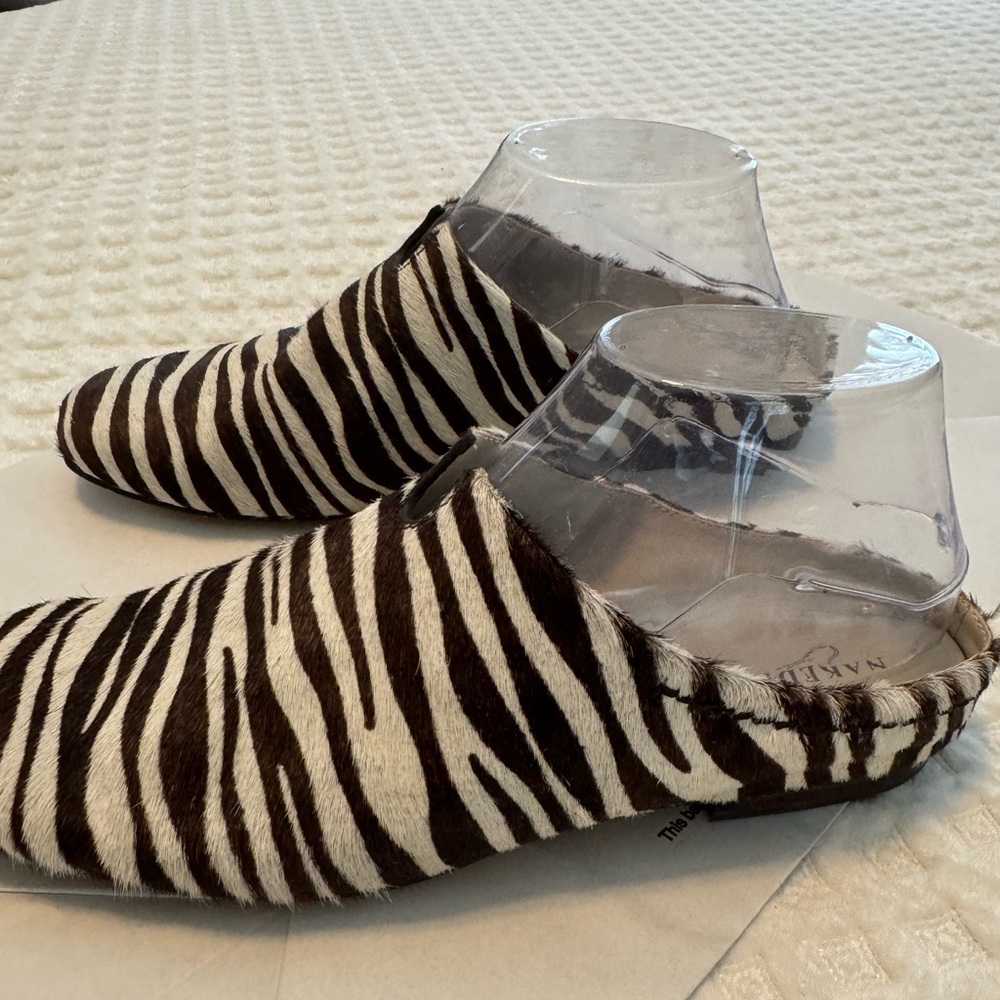 Zebra Print Slip-On Shoes size 8. Worn one time.
